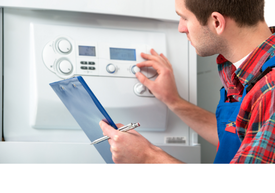 Engineer servicing a boiler